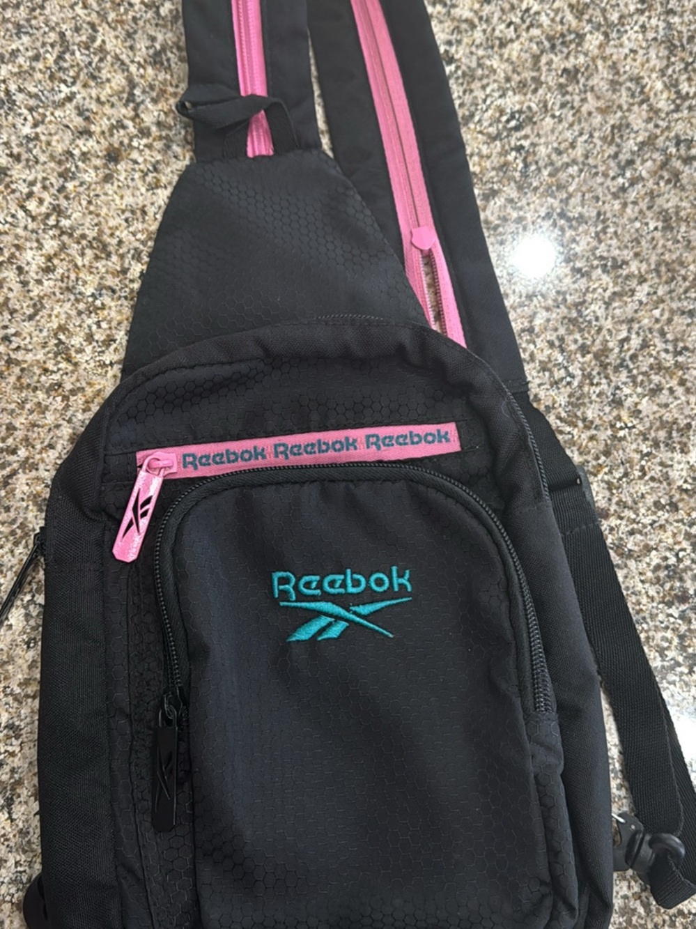 Reebok Black Crossbody Sling Bag with Pink Zippers